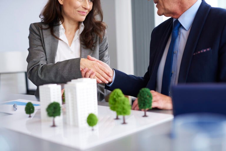 Close up of business partners shaking hands