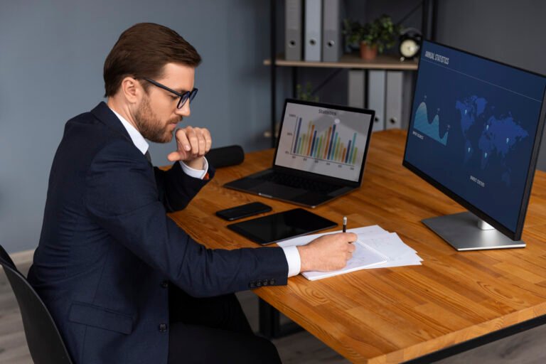 person-looking-finance-graphs